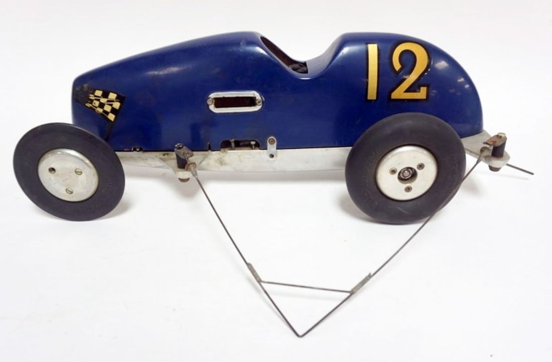 VINTAGE TETHER RACE CAR: VINTAGE LARGE SCALE MODEL TETHER RACE CAR, APPROXIMATELY 17 IN X 8 IN X 6 1/2 IN, *ALL TOYS HAVE WEAR TO BOXES AND NOT GUARANTEED COMPLETE