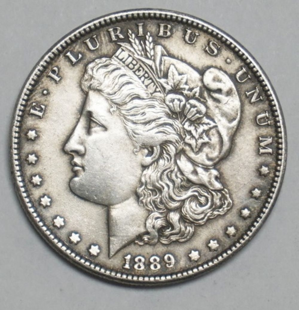 1889 MORGAN SILVER DOLLAR (1 of 2)