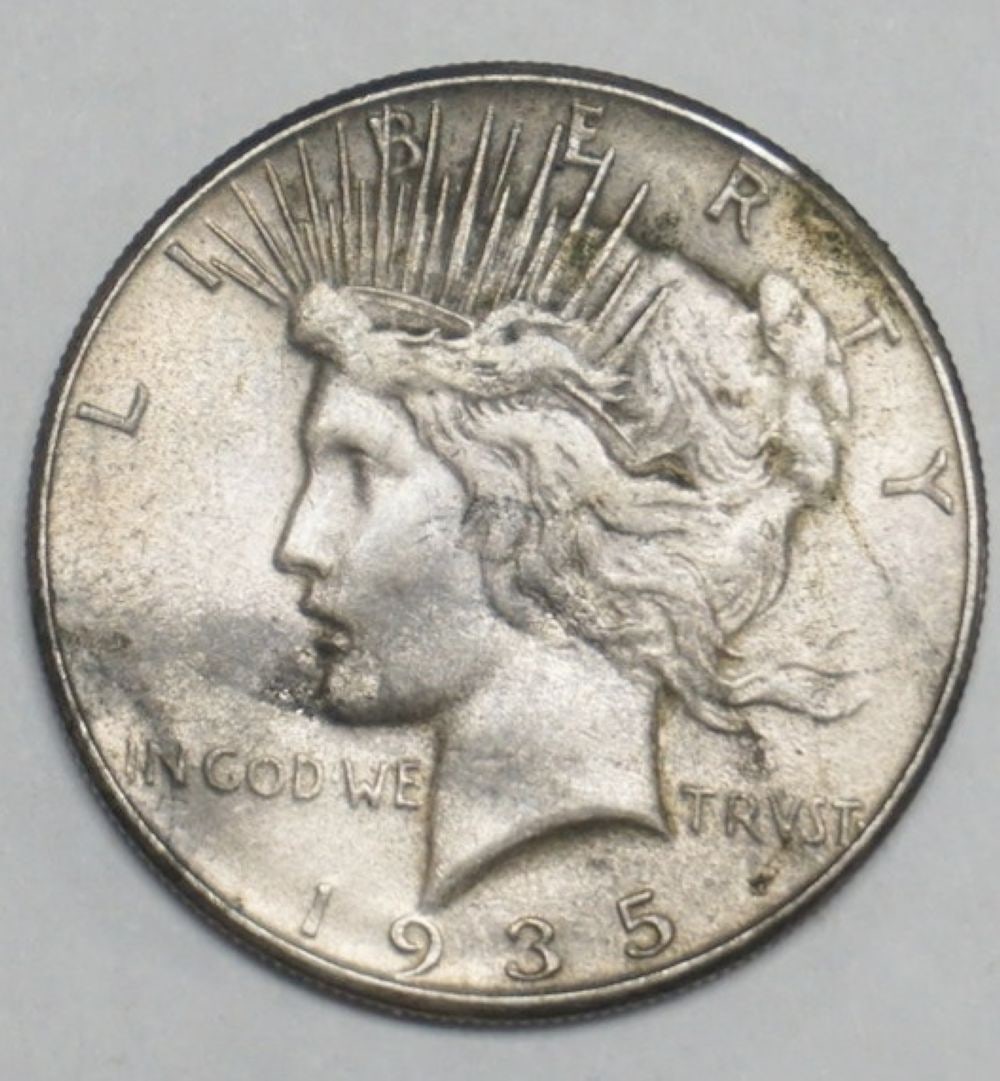 1935 PEACE SILVER DOLLAR (1 of 3)