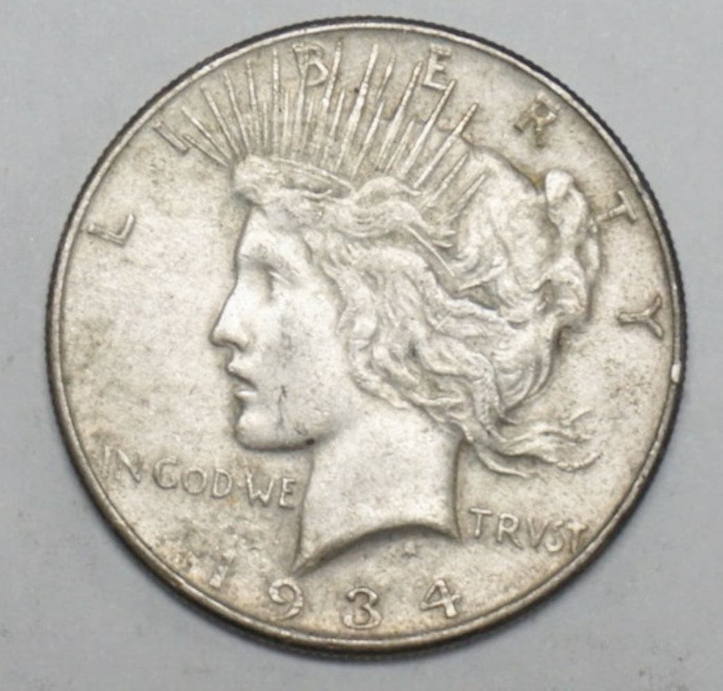 1934 PEACE SILVER DOLLAR (1 of 2)
