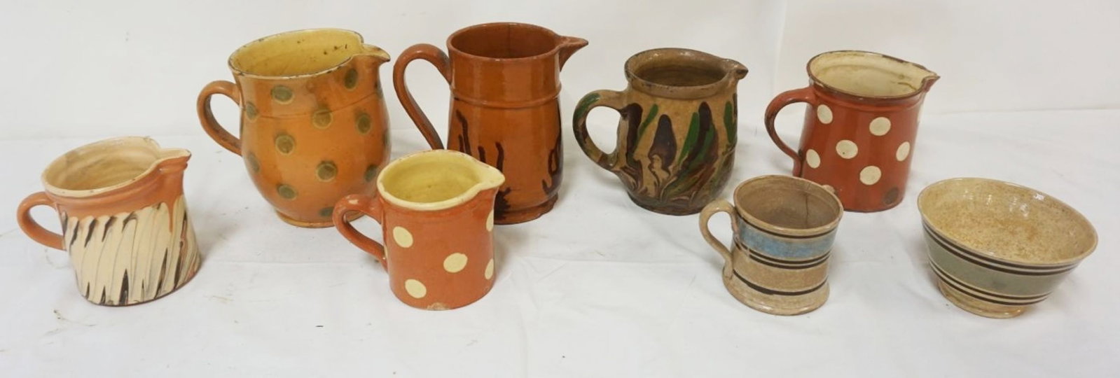 GROUP OF SLIP DECORATED POTTERY (1 of 6)