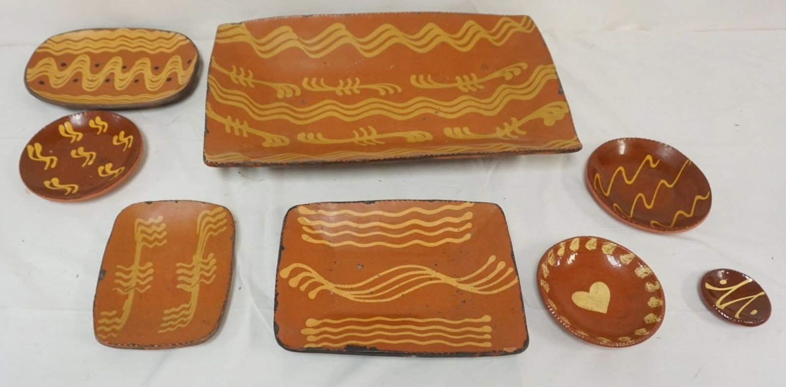 LARGE GROUP OF SLIP DECORATED POTTERY (1 of 10)