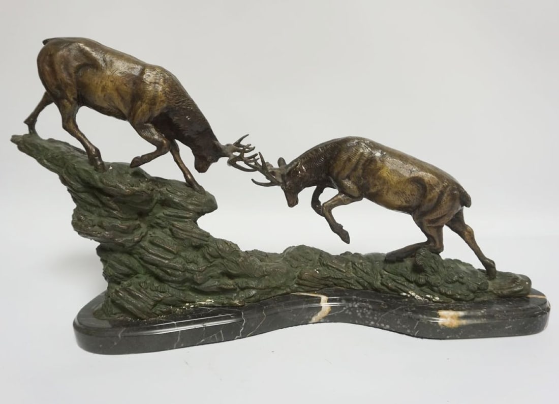 CONTEMPORARY BRONZE: CONTEMPORARY BRONZE OF STAGS BATTLING ON MARBLE BASE, LOSS TO ONE HORN, APPROXIMATELY 21 IN X 7 IN X 13 IN HIGH