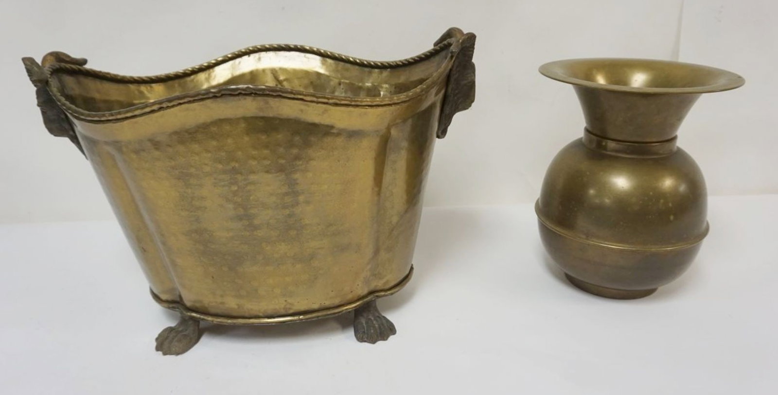 BRASS RAMS HEAD KINDLING HOLDER & SPITTOON: BRASS RAMS HEAD PAW FOOT KINDLING HOLDER & SPITTOON, LARGEST PIECE APPROXIMATELY 21 IN X 14 IN X 14 IN HIGH