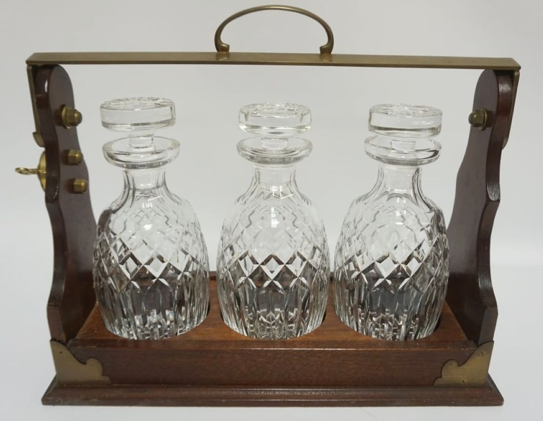 LOCKING TANTALUS W/KEY: LOCKING TANTALUS W/KEY HAVING 3 CRYSTAL DECANTORS, APPROXIMATELY 16 IN X 7 IN X 14 IN HIGH