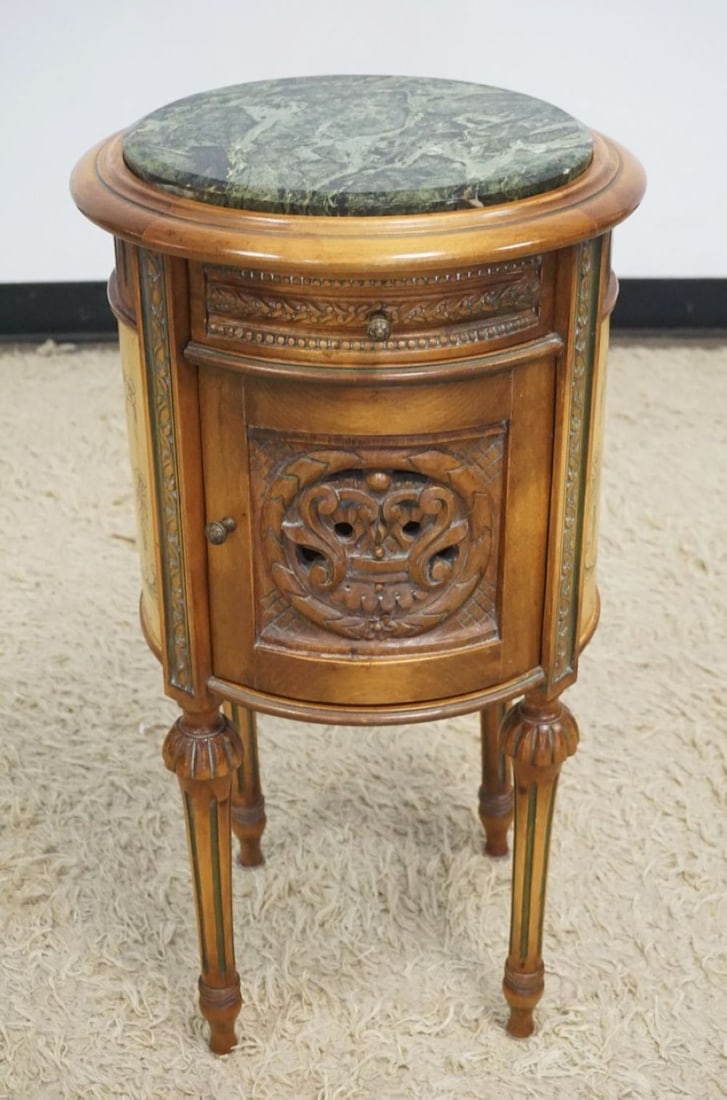 ROUND OCCASIONAL STAND/LAMP TABLE: ROUND OCCASIONAL STAND/LAMP TABLE W/GREEN INSET MARBLE TOP, ONE DRAWER OVER ONE PIERCED CARVED DOOR & PANELED STENCILED CREST DESIGN SIDES & BACK, APPROXIMATELY 16 IN X 29 IN HIGH