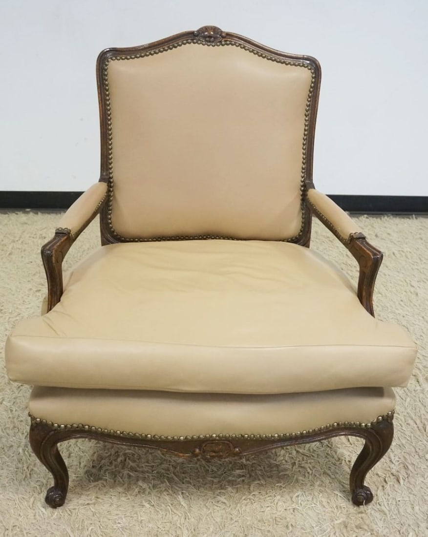 FRENCH PROVINCIAL LEATHER ARM CHAIR: FRENCH PROVINCIAL LEATHER ARM CHAIR W/BRASS TACK ACCENTS, APPROXIMATELY 30 IN X 24 IN X 38 IN HIGH
