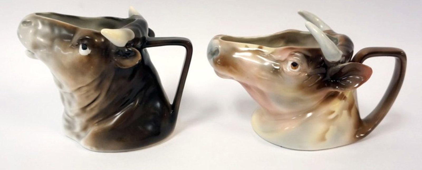 ROYAL BAYREUTH BULLS HEAD: ROYAL BAYREUTH BULLS HEAD CREAMERS, EACH APPROXIMATELY 6 IN X 4 1/2 IN X 5 IN HIGH