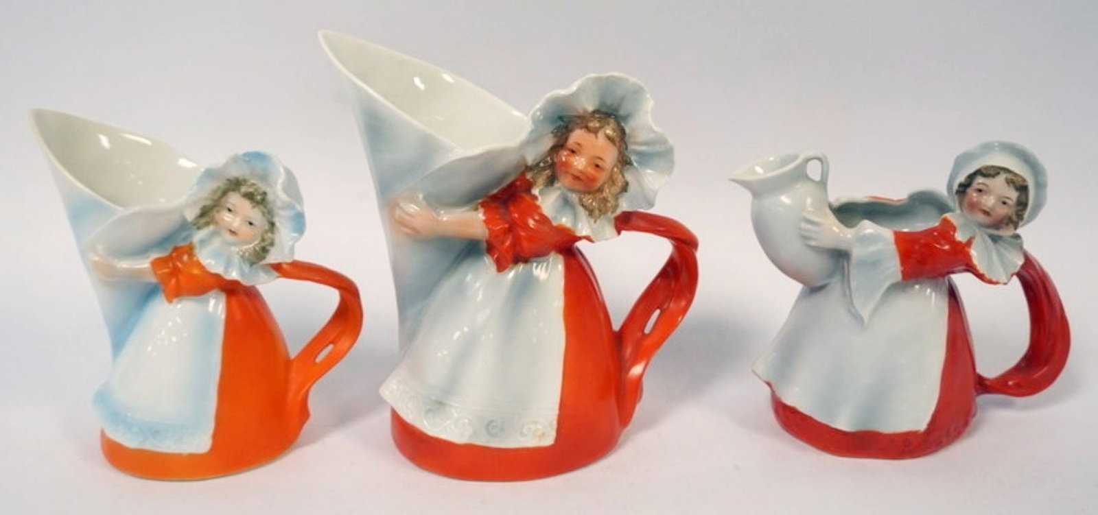 ROYAL BAYREUTH MILK MAID/COLONIAL GIRL: ROYAL BAYREUTH MILK MAID/COLONIAL GIRL CREAMERS, TALLEST APPROXIMATELY 5 IN HIGH