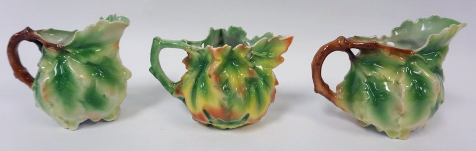 ROYAL BAYREUTH GREEN LEAF: ROYAL BAYREUTH GREEN LEAF CREAMERS, TALLEST APPROXIMATELY 5 IN HIGH