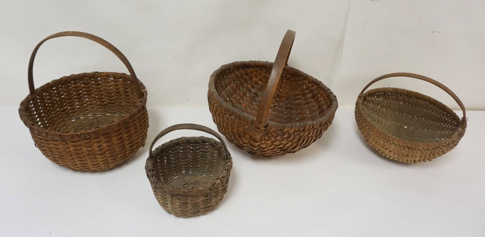 GROUP OF 4 SPLINT WOOD WOVEN BASKETS (1 of 4)