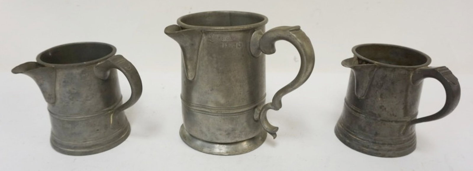 PEWTER PUB MEASURES: PEWTER SPOUTED PUB MEASURES, LARGEST APPROXIMATELY 6 IN H