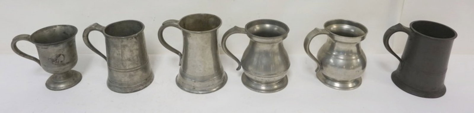 PEWTER TANKARDS: PEWTER TANKARDS AND MEAURES, TALLEST APPROXIMATELY 7 IN H