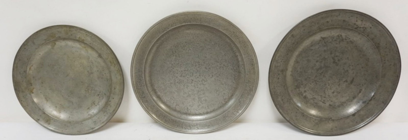 PEWTER CHARGERS: PEWTER CHARGERS, 2 MARKED TOWNSEND AND COMPTON, LAREST APPROXIMATELY 13 1/2 IN