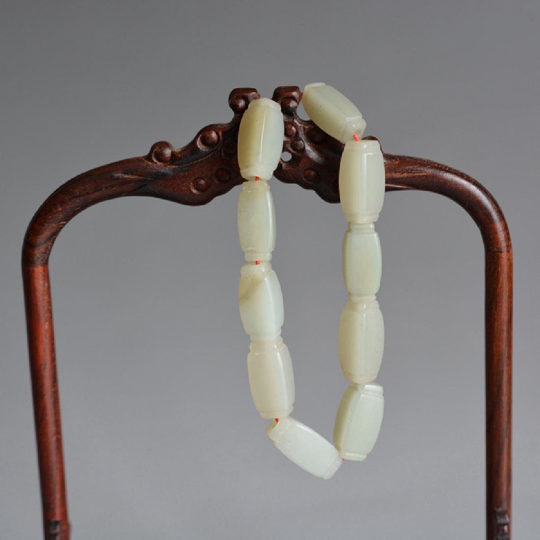 Chinese Carved Jade Bracelets: Chinese Carved Jade Bracelets Very good condition,Bead size:0.7cm/1.3cm. If you have questions or want to buy it now, please contact us.