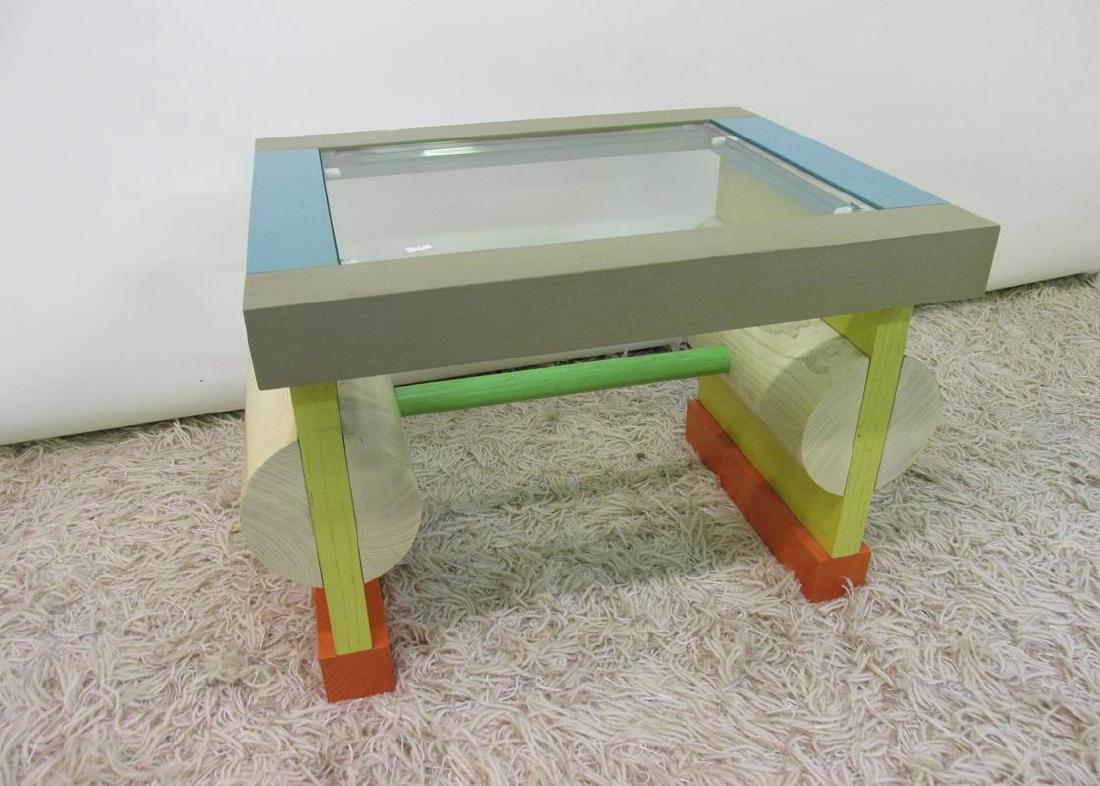 RARE - ETTORE SOTTSASS MEMPHIS SIDE TABLE: "THEY THOUGHT IT WAS COMING FROM BURMA", BRASS LABEL, 1987, BLUM HELMAN GALLERY, NY. SEE PHOTO FOR CONDITION. 23.25"X17.75". HEIGHT IS 16.5"