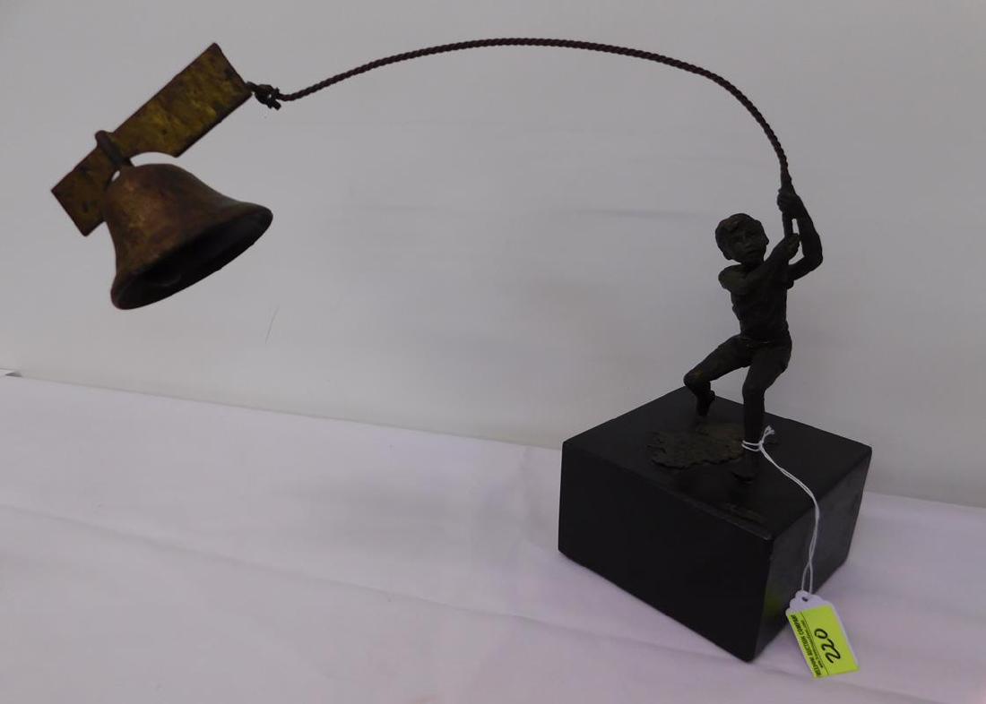 CURTIS JERE FIGURAL SCULPTURE: DEPICTING BOY RINGING AN OPERABLE BELL