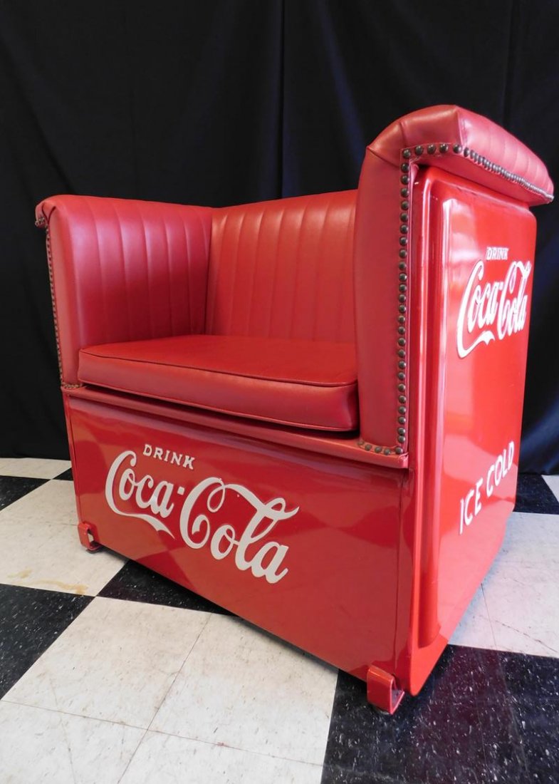 COCA-COLA SETTEE: FORMED FROM AN ORIGINAL VENDO COOLER FRAME. MISSING TWO UPHOLSTERY STUDS.