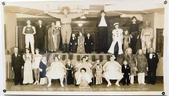 EDWARD J. KELTY (AMERICAN, 1888-1967) PHOTOGRAPH: LARGE FORMAT, ORIGINAL KELTY PHOTOGRAPH DEPICTING RINGLING BROTHERS AND BARNUM & BAILEY COMBINED CIRCUS, 1937. "CONGRESS OF FREAKS" SIDE SHOW ACT INCLUDING JACK EARLE, DOLL FAMILY AND OTHERS. DOUBLE R