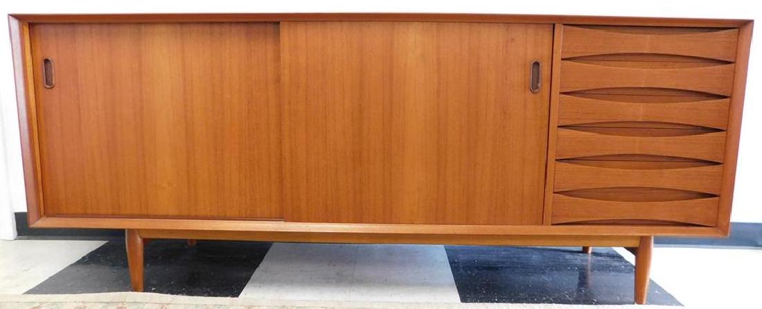 ARNE VODDER FOR SIBAST #OS-29 BUFFET/CREDENZA: ORIGINAL CABINET IS ONE OWNER SINCE 1963. COMES WITH COPIES OF ORIGINAL INVOICES, PAPERWORK AND LITERATURE AS WAS RECEIVED WHEN AMERICAN SERVICE MEMBER HAD THIS IMPORTED FROM DANSK FORM. INTERIOR LABE