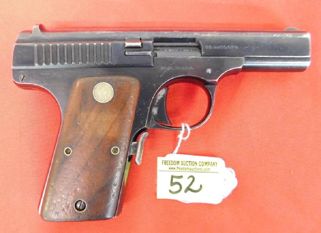 SMITH & WESSON MODEL OF 1913 AUTOMATIC PISTOL: C&R. SERIAL #717. .35 CAL. BARREL APPEARS TO STAMPED AS A .32. BLUED, 7-SHOT MAGAZINE, 3 1/2" BARREL, SMOOTH WALNUT GRIPS. C.1913-1921. FINE CONDITION