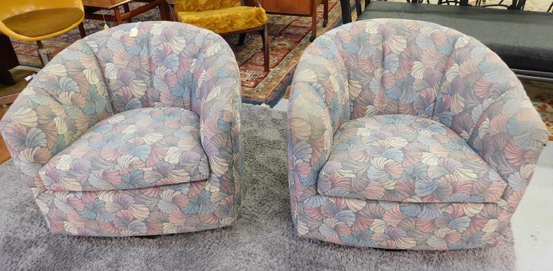 PAIR OF MILO BAUGHMAN (ATTR.) CLUB CHAIRS: SWIVEL ON WOODEN PLINTH BASE