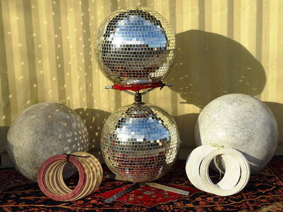 "ROGANA" BALANCE ACT PROPS: INCLUDES PAIR OF MIRROR BALLS, STAND, BALANCE SPHERE AND FLIGHT CASE BY PIERRE BEAUVAIS. ROGANA WAS KNOWN AS THE "BARONESS OF BALANCE" HAVING PERFORMED ON RBBB AND SEVERAL OTHER SHOWS. Only one of