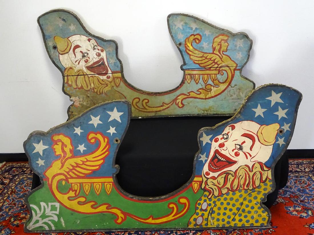 PAIR VINTAGE CARNIVAL RIDE PANELS - CLOWN: PAIR OF HAND-PAINTED WOODEN CHARIOT/CAROUSEL SIDE PANELS FOR CARNIVAL RIDE. LENGTH 70"