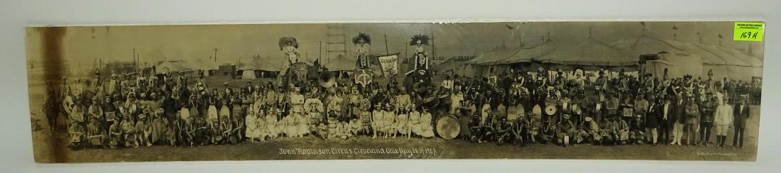 JOHN ROBINSON CIRCUS PANORAMIC PHOTOGRAPH: CLEVELAND, OHIO, MAY 18-19, 1923. ORIGINAL BY THE MERCHROE CO. DARKNESS IN PHOTO IN LEFT MARGIN. 8"X42"