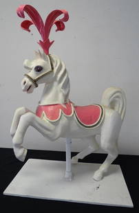 MIHALY "MICHU" MEZAROS SPECTACLE HORSE: RESIN MINIATURE CAROUSEL HORSE RIDDEN BY MICHU. MIHALY "MICHU" MESZAROS (1939-2016) WAS A PERFORMER KNOWN AS THE "SMALLEST MAN IN THE WORLD" ON THE RINGLING BROTHERS AND BARNUM & BAILEY CIRCUS AND