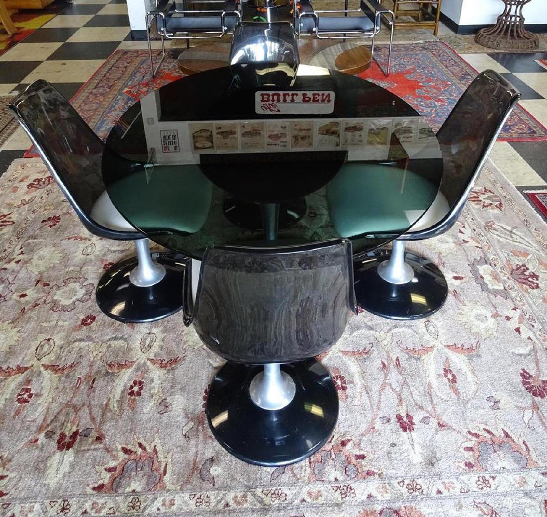 CHROMCRAFT LUCITE DINING SET: 4 SWIVEL SMOKED LUCITE TULIP CHAIRS, SMOKED GLASS TOP.