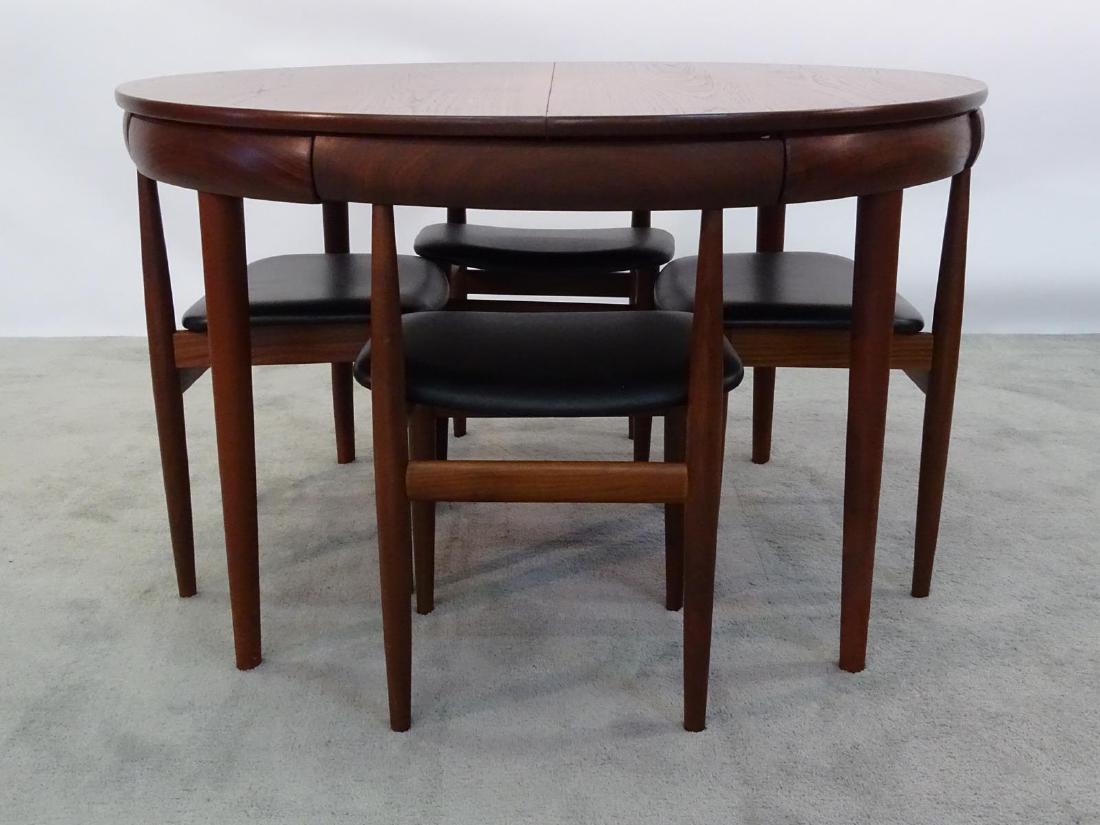 HANS OLSEN FOR FREM ROJLE DINETTE: FEATURES 47" DINING TABLE WITH 4 NESTING DINING CHAIRS.