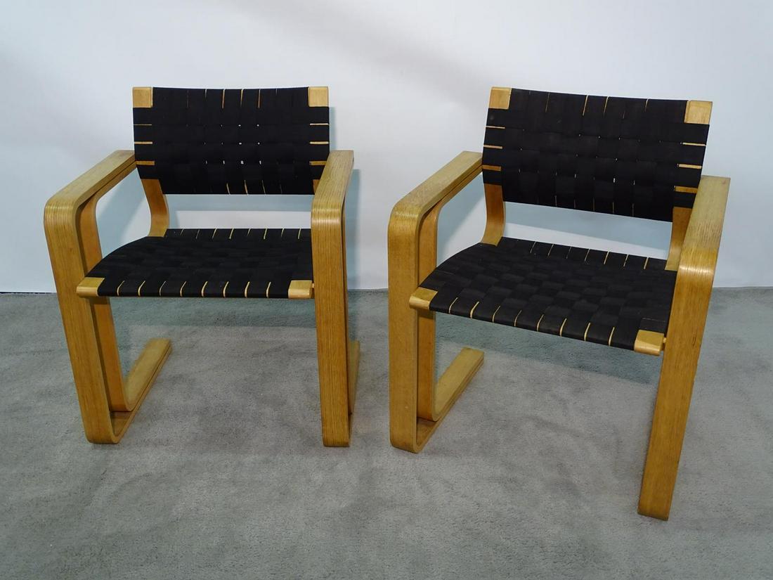 PAIR CANTILEVERED CHAIRS, MANNER OF ALVAR AALTO: BIRCH, HAVING WEBBING, MADE IN DENMARK, RUDD INTERNATIONAL.