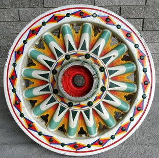 RBBB WAGON WHEEL - GEORGE ESCALARA: ORIGINAL RINGLING WAGON WHEEL, PAINTED IN 1944 BY G. ESCALERA. EACH SIDE IS PAINTED DIFFERENLY. WELDED SUPPORTS CAN BE USED AS COFFEE TABLE OR DISPLAY