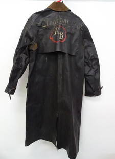 RINGLING BROS. BARNUM BAILEY COAT: ROY BUSH COLLECTION. ORIGINAL RBBB ELEPHANT TRAINER RUBBER COAT AS WAS USED IN RAIN OR WASHING. RINGLING BROS. LOGO AND ELEPHANT DEPT. HAND PAINTED ON BACK. RUBBER IS STIFF FROM AGE.