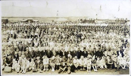 EDWARD J. KELTY (1888-1967) PHOTOGRAPH: ORIGINAL KELTY PHOTOGRAPH OF THE 1934 RBBB CIRCUS CAST INCLUDING THE SIDESHOW. RUBBER STAMP ON VERSO.