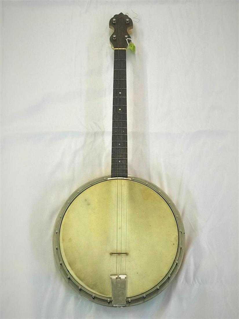 RARE - CF TENOR MARTIN 4-STRING BANJO: C.1920'S. ONLY 96 MADE. GROVER PATENT NUMBER. C.F. MARTIN MARK. WITH ORIGINAL CASE.