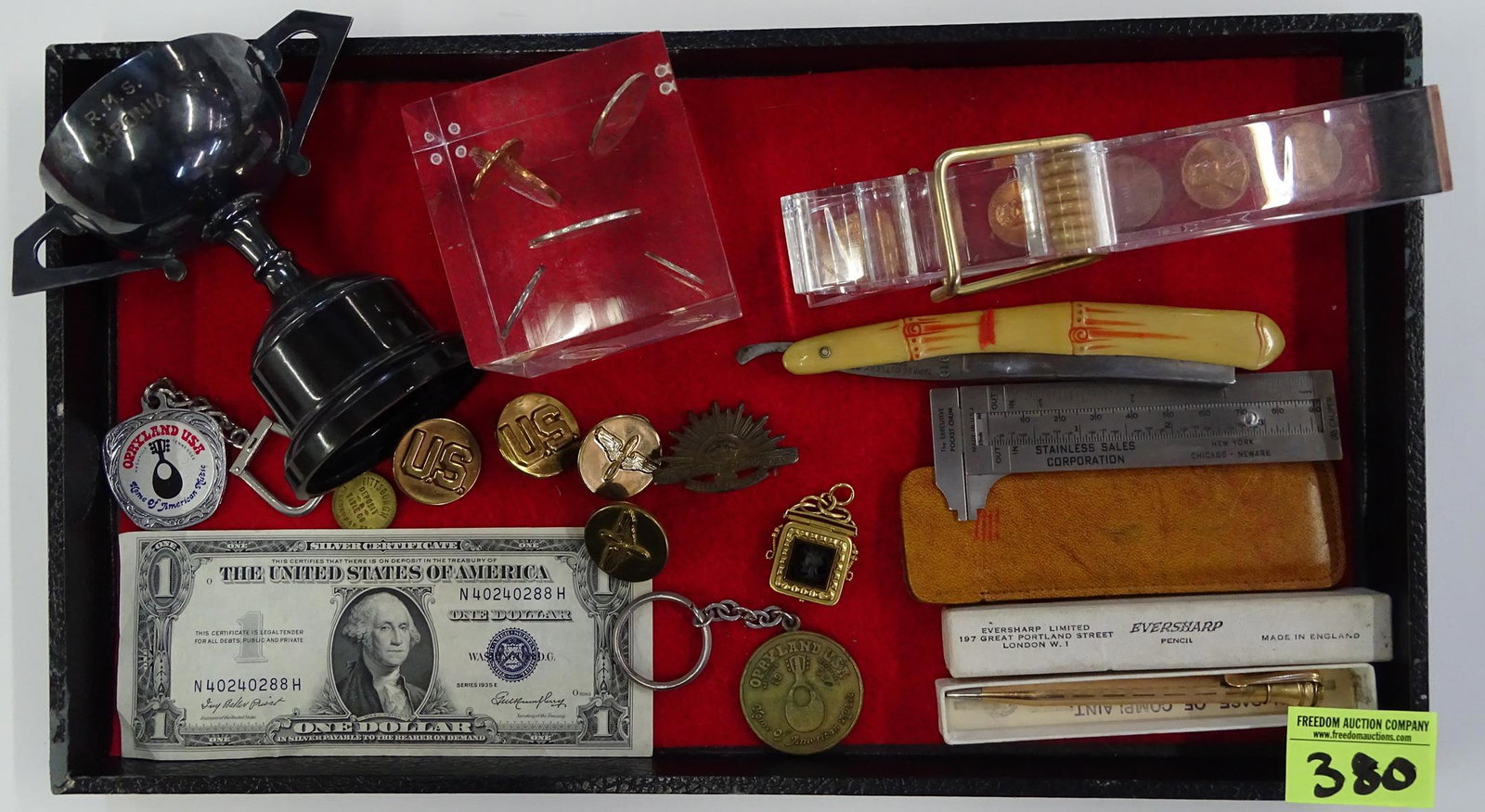 MAN'S DESK LOT: LUCITE PAPERWEIGHT & CLOTHESPIN, MICROMETER, MILITARY PINS, STRAIGHT RAZOR, GOLD FILLED PENCIL AND BOX, TROPHY, SILVER CERTIFICATE.