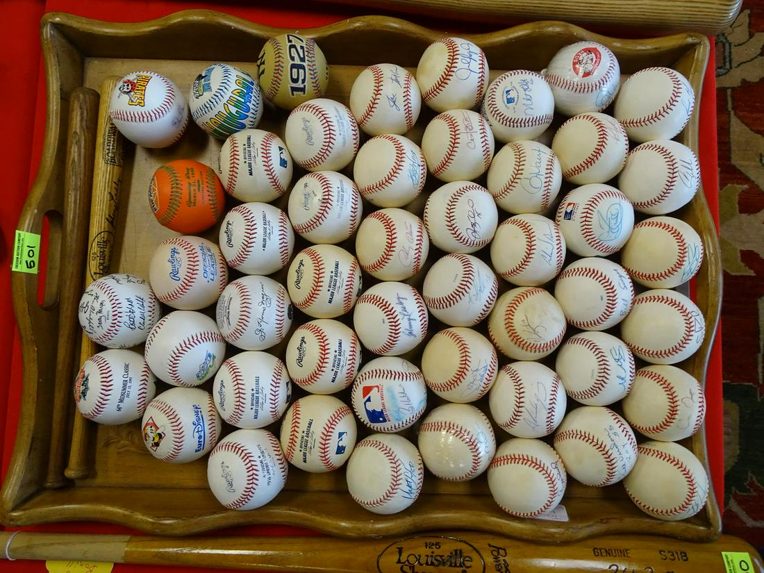 COLLECTION OF BASEBALLS: INCLUDING MANY AUTOGRAPHS AND MLB BASEBALLS. SEAN CASEY, NATE MALOUTH, TIM FOLI, JULIO LUGO, ORLANDO MERDCED, DENNY HOCKING, CRAIG WILLSON, ABRAHAM NUNEN, BUTCH HUTCHSKY, CARLOS PENA AND OTHERS.