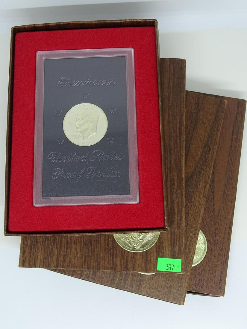 TRIO OF BROWN IKE SILVER PROOF DOLLARS: 1972, 1974(2). OGP