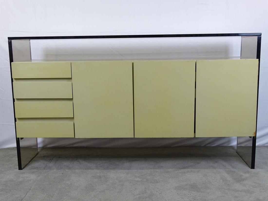 MILO BAUGHMAN FOR THAYER COGGIN CREDENZA: LACQUERED CABINET SET WITH SMOKED LUCITE SIDE PANELS, CHROME FITTINGS AND HEAVY SMOKED GLASS TOP. WEAR TO CABINET CONSISTENT WITH AGE. 64"X15"X36"