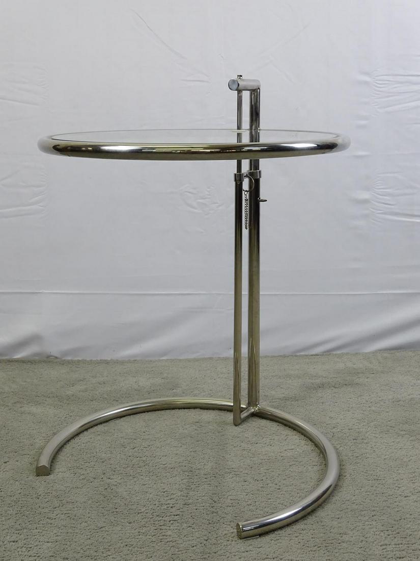 EILEEN GRAY ADJUSTIBLE SIDE TABLE: CHROME FRAME WITH GLASS TOP IN GOOD CONDITION.