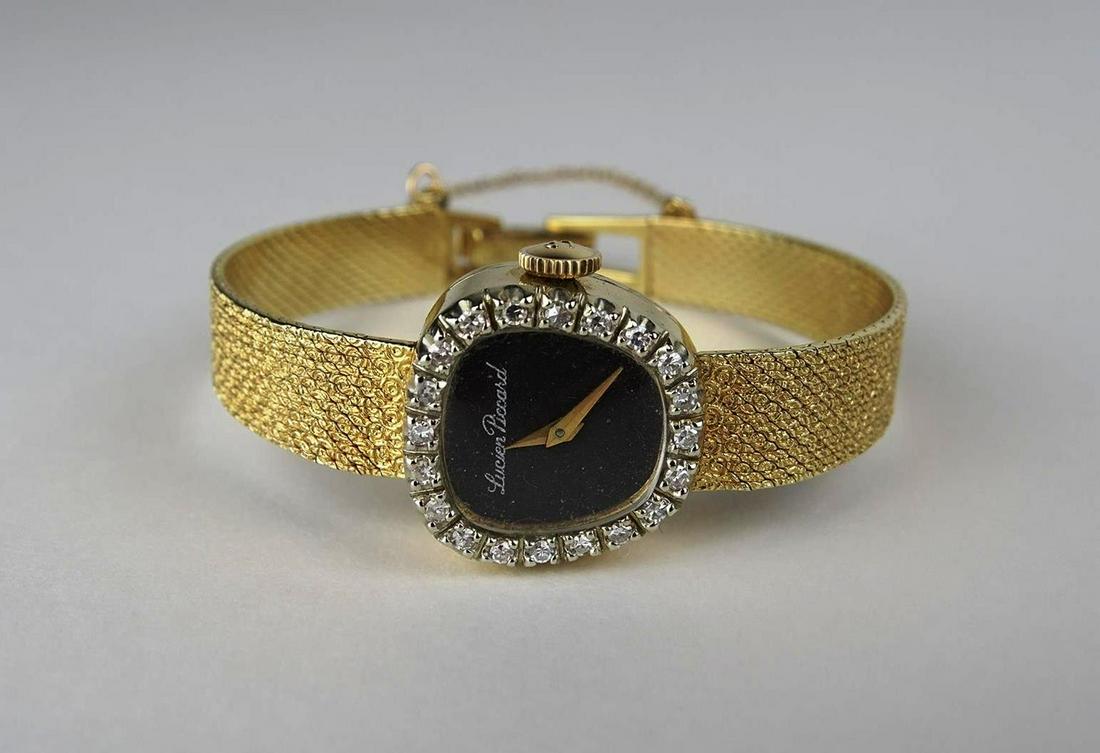 LUCIEN PICCARD 18K GOLD/DIAMOND WATCH: 18K GOLD WITH ORIGINAL FELT BOX. 20 DIAMONDS SURROUNDING BEZEL. RUNNING AT TIME OF SALE.