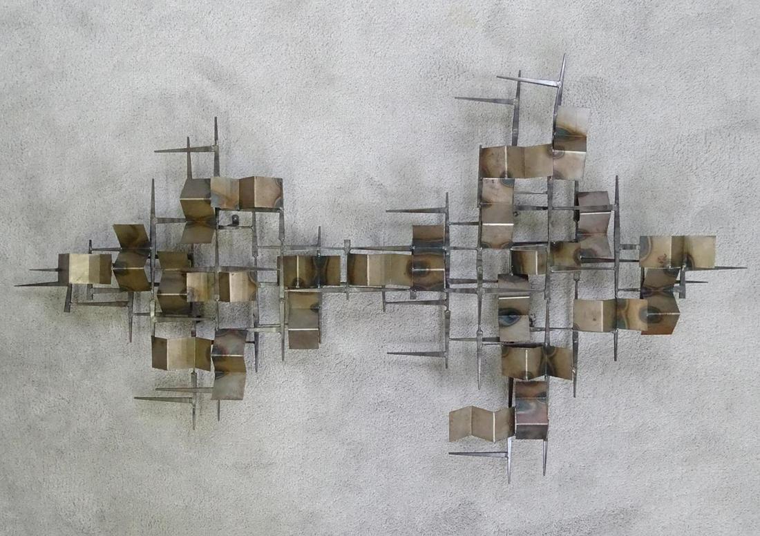 BRUTALIST METAL WALL ART SCULPTURE: HAVING WELDED METAL PLATES AND SPIKES. 27"X48".