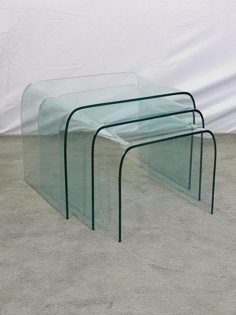 BENT GLASS WATERFALL NEST OF TABLES: LIGHT, SUPERFICIAL SCRATCHES CONSISTENT WITH AGE AND USE. 24"X17"X17"