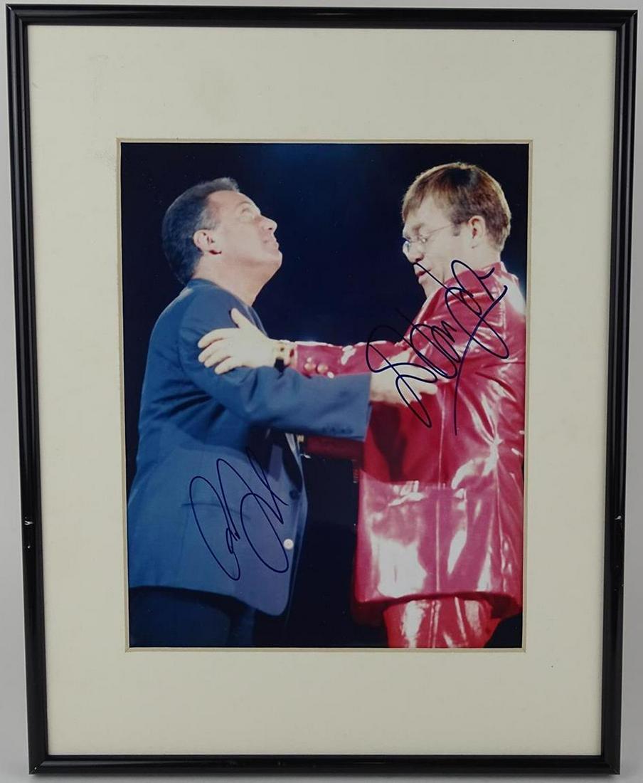 ELTON JOHN, BILLY JOEL SIGNED PHOTOGRAPH: WITH CERTIFICATE OF AUTHENTICITY BY CONSOLIDATED SPORTS. 8"X10"
