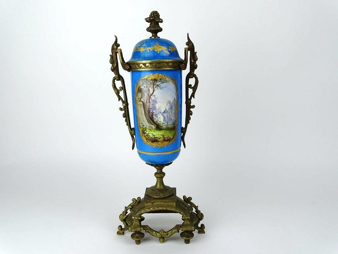SEVRES ORMOLU MOUNTED URN: HAND-PAINTED PORCLAIN. MARKED BRUNFAUT. 14"H