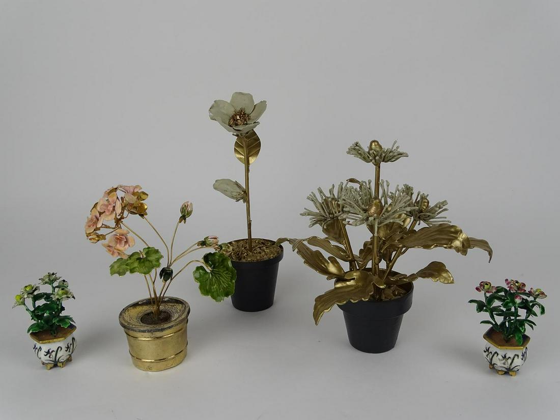 GROUPING OF METAL ART FLOWERS: ONE IS STERLING SILVER. RANGING IN SIZE FROM 3"-8"