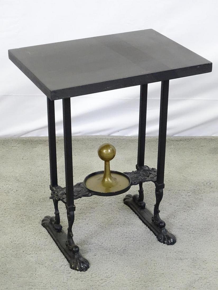 ANTIQUE SIDE TABLE: CAST IRON BASE WITH BRASS FINIAL, PAW FEET. 16"X12"X20".