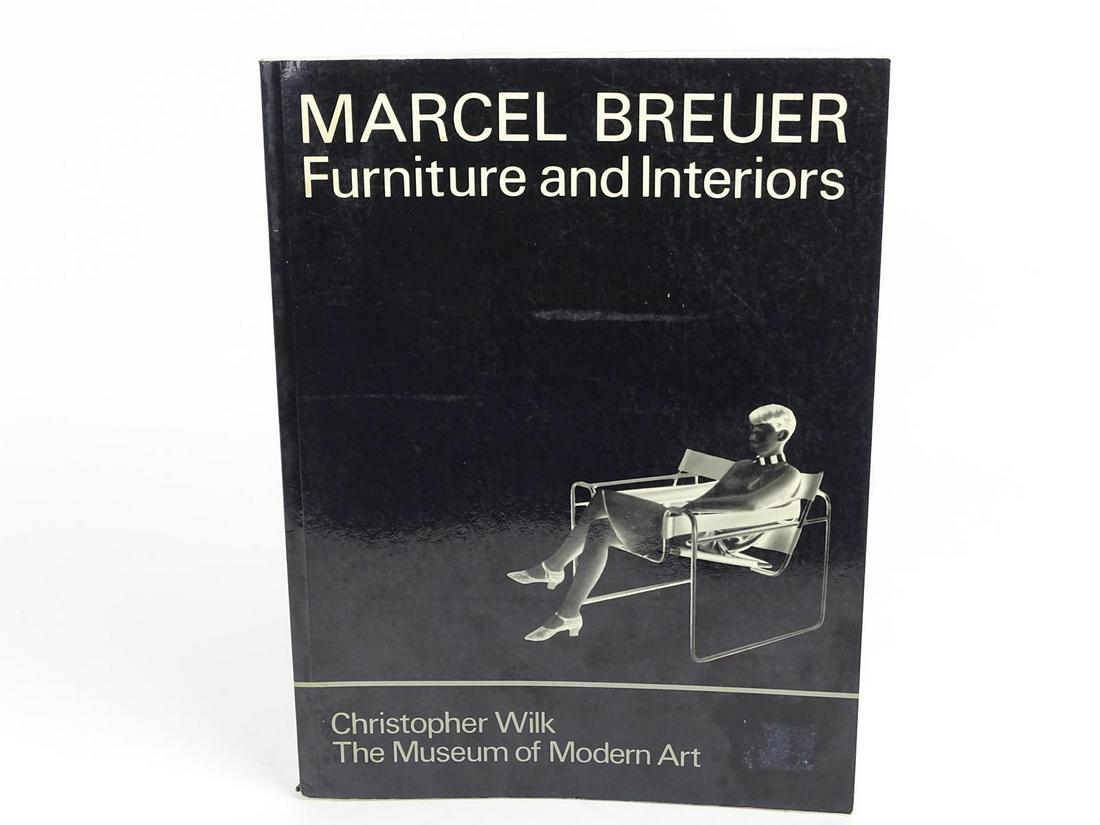 "MARCEL BREUER FURNITURE & INTERIORS" BY WILK: MOMA, PAPERBACK. 192 PAGES. WATER STAINING.